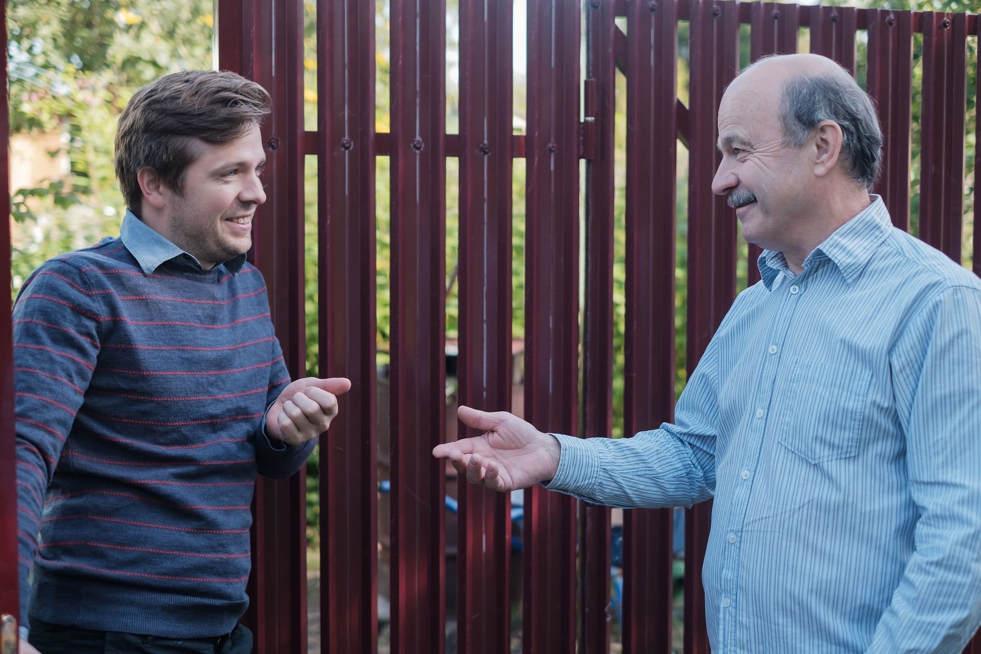 Two Friends And Neighbors Talking